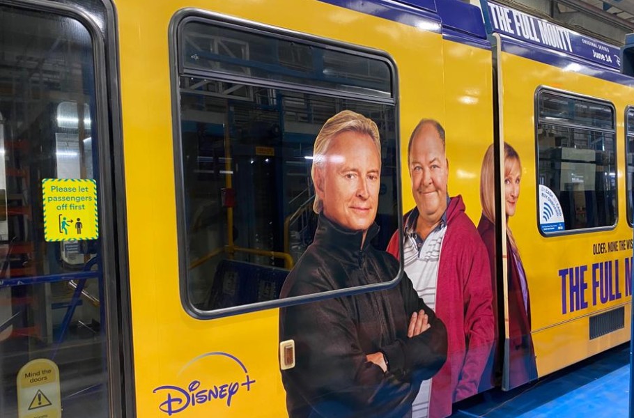 The Full Monty advertisement on a tram